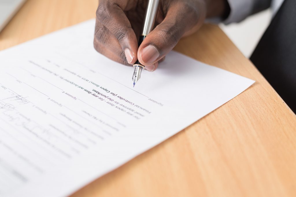 person signing contract document